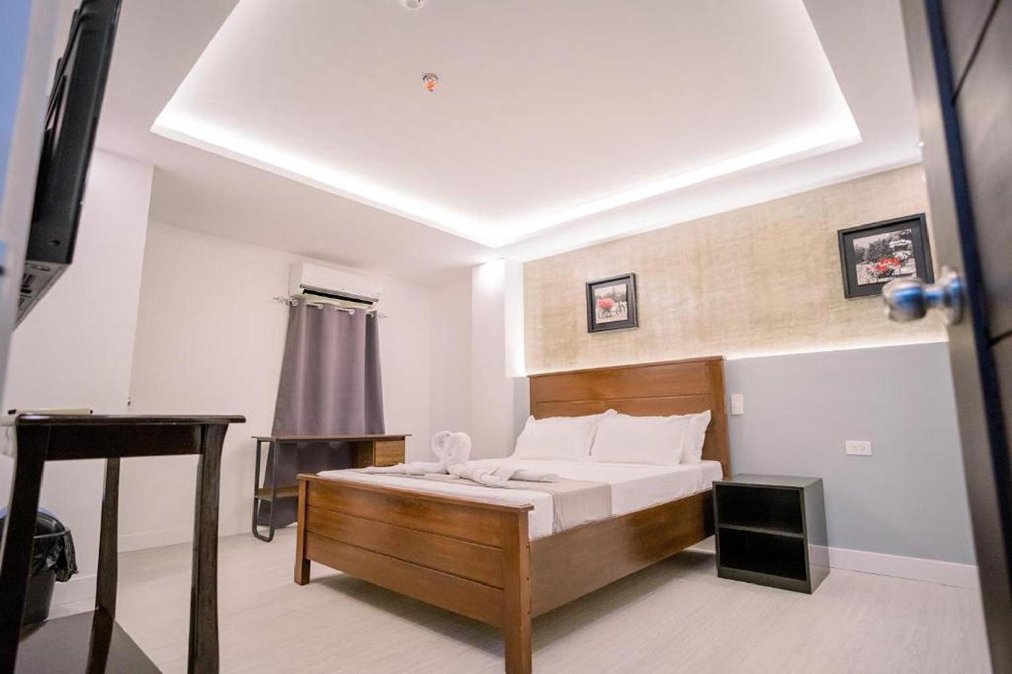 Spotlight Hotel Near Hundred Islands Wharf อลามินอส ภายนอก รูปภาพ